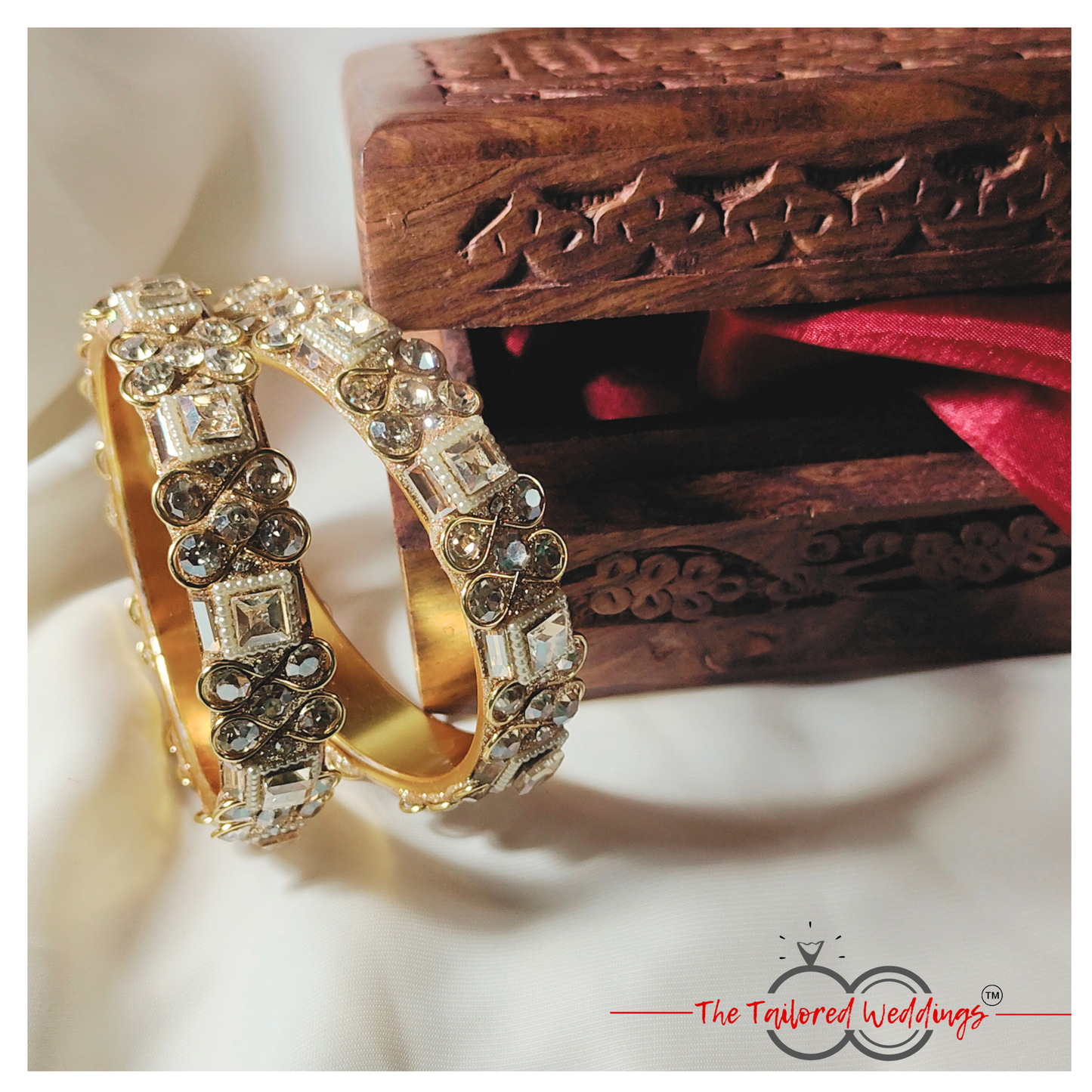 Traditional lac-metal Kangan bangles studded with pearl moti and shimmering shadow stones