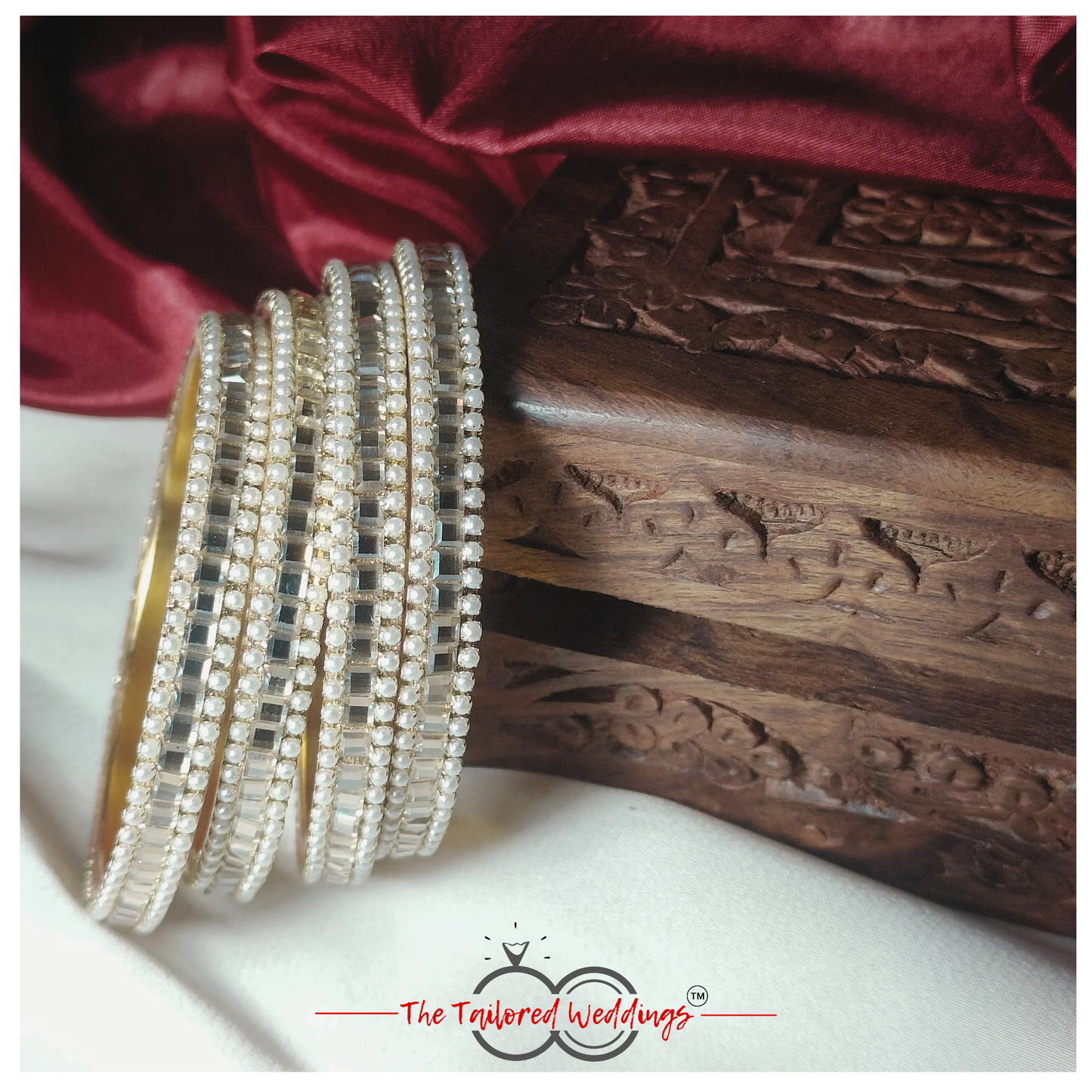 Traditional Indian lac and metal bangle studded with delicate moti and glimmering shadow stones