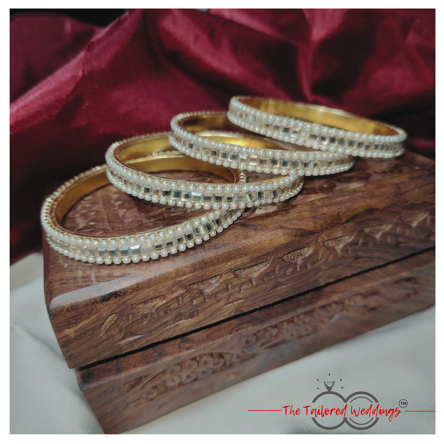 Traditional Indian lac and metal bangle studded with delicate moti and glimmering shadow stones