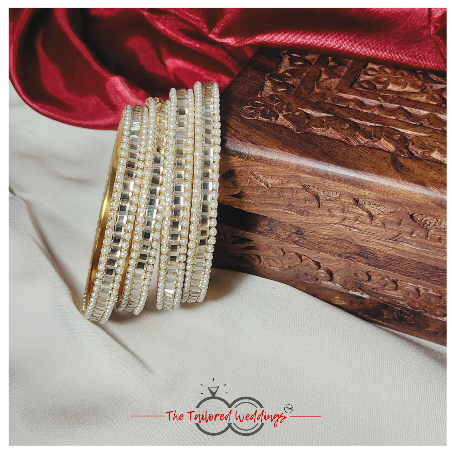 Traditional Indian lac and metal bangle studded with delicate moti and glimmering shadow stones