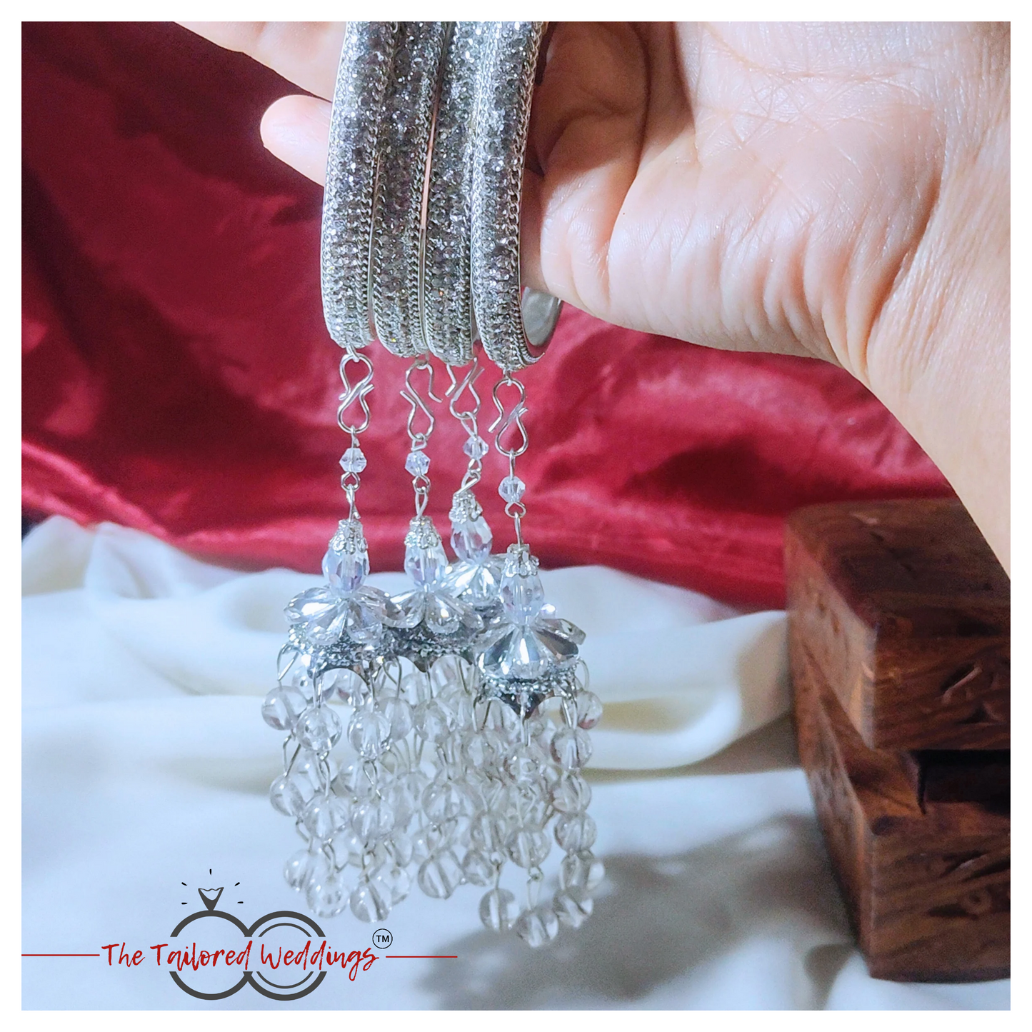 Silver lac and metal latkan bangles adorned with small studded stones and handcrafted detailing
