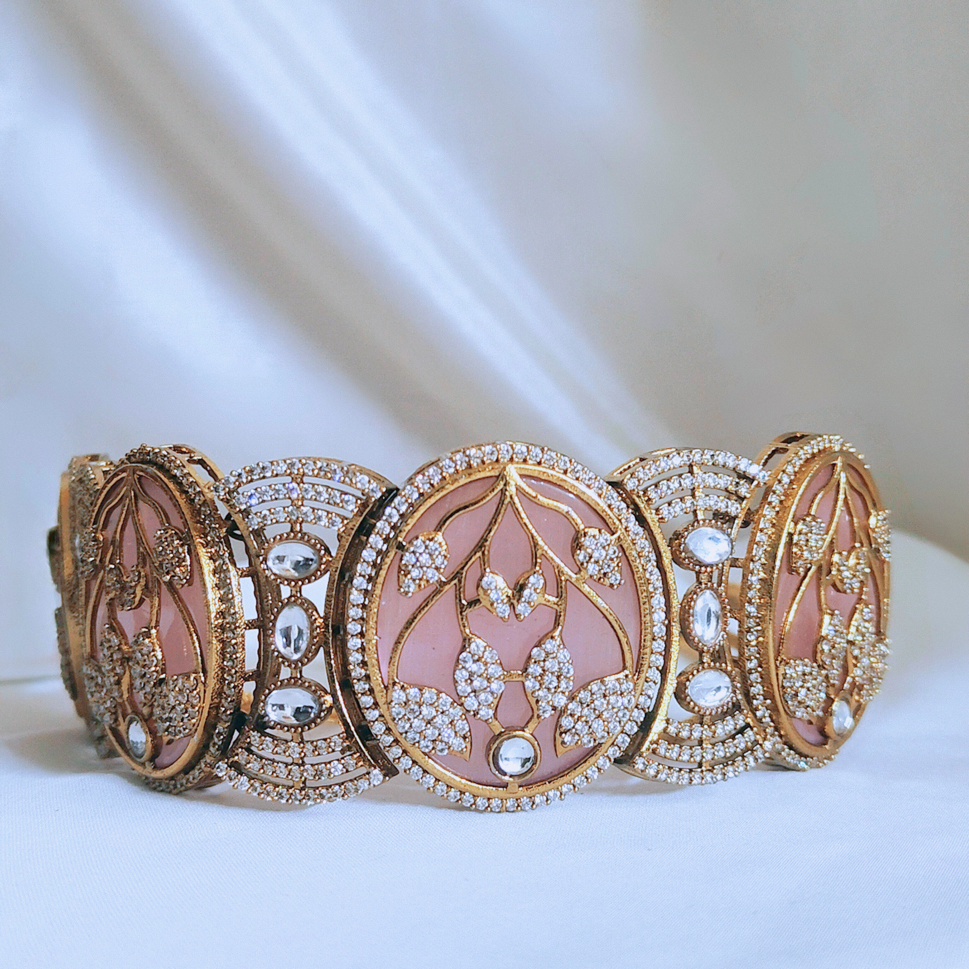 Stone-studded choker necklace set featuring leaf patterns – perfect for weddings and festive occasions.