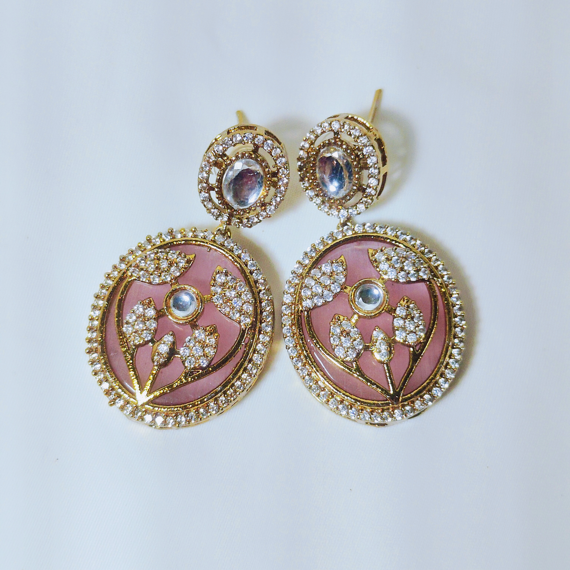Stone-studded choker necklace set featuring leaf patterns – perfect for weddings and festive occasions.