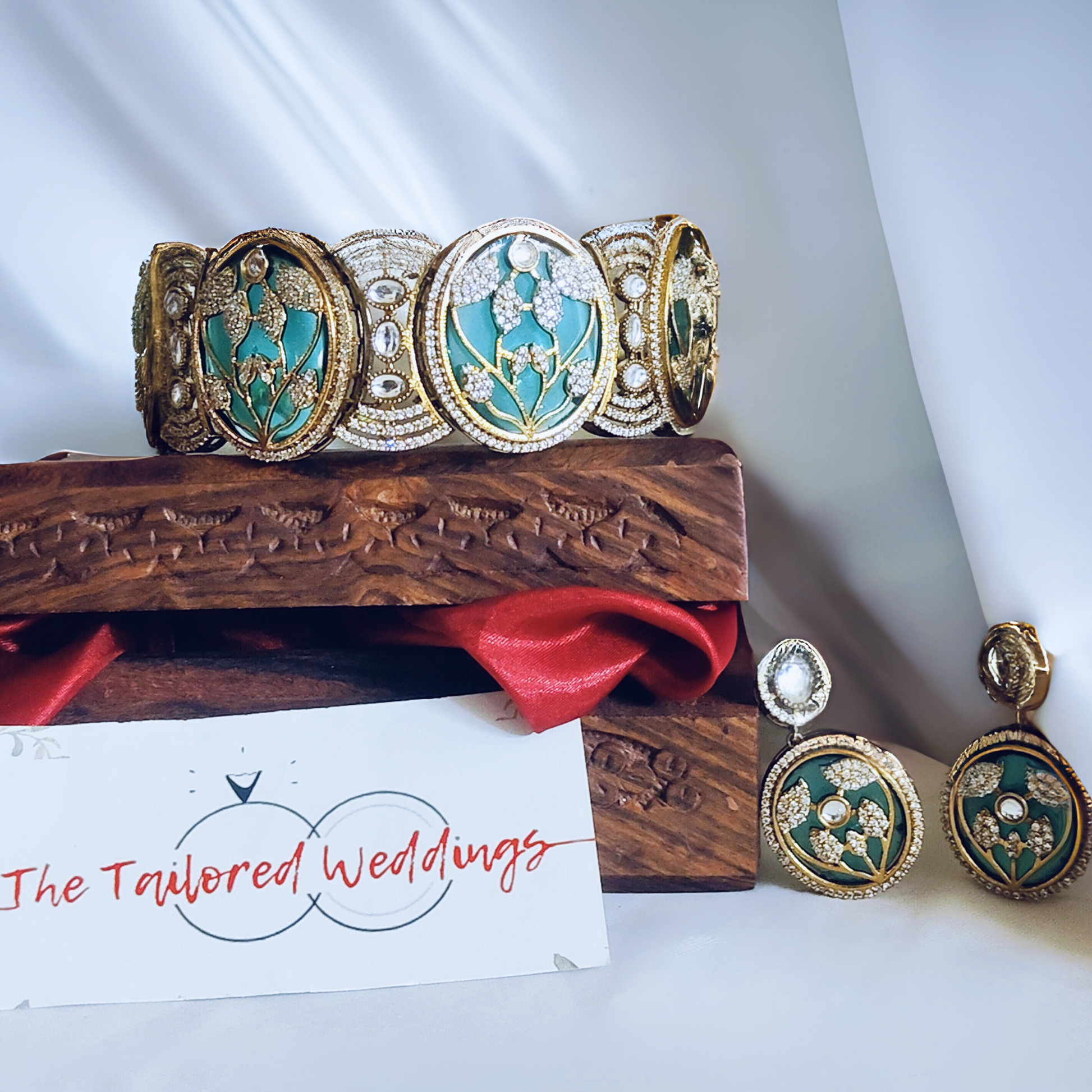 Stone-studded choker necklace set featuring leaf patterns – perfect for weddings and festive occasions.